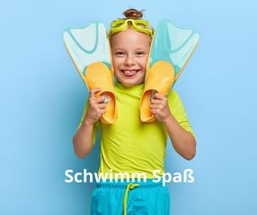 little-girl-swimmer-wears-goggles-holds-flippers